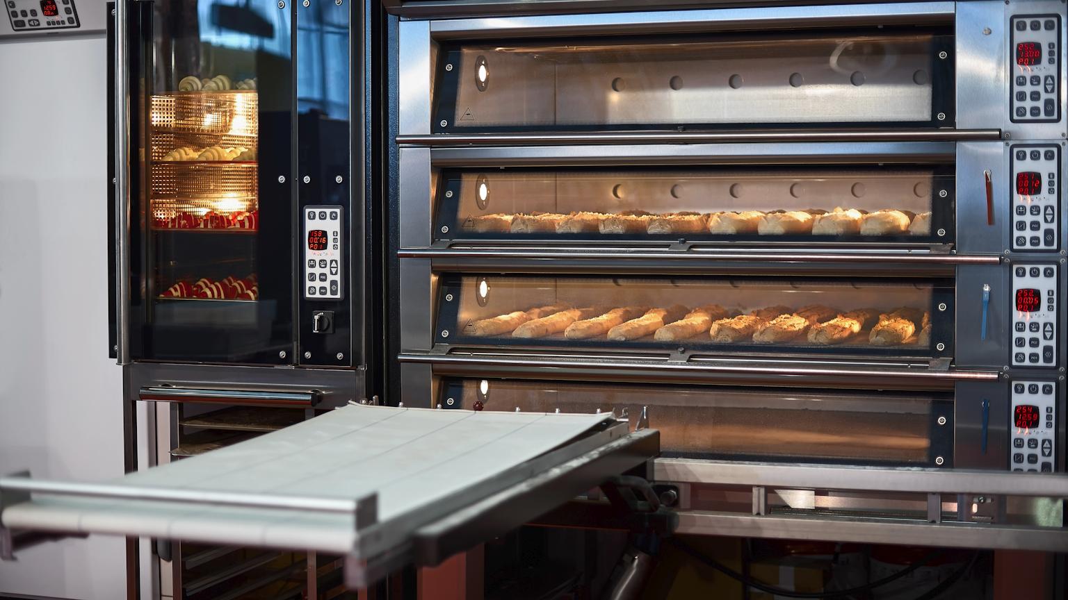 Technician repairing a commercial oven