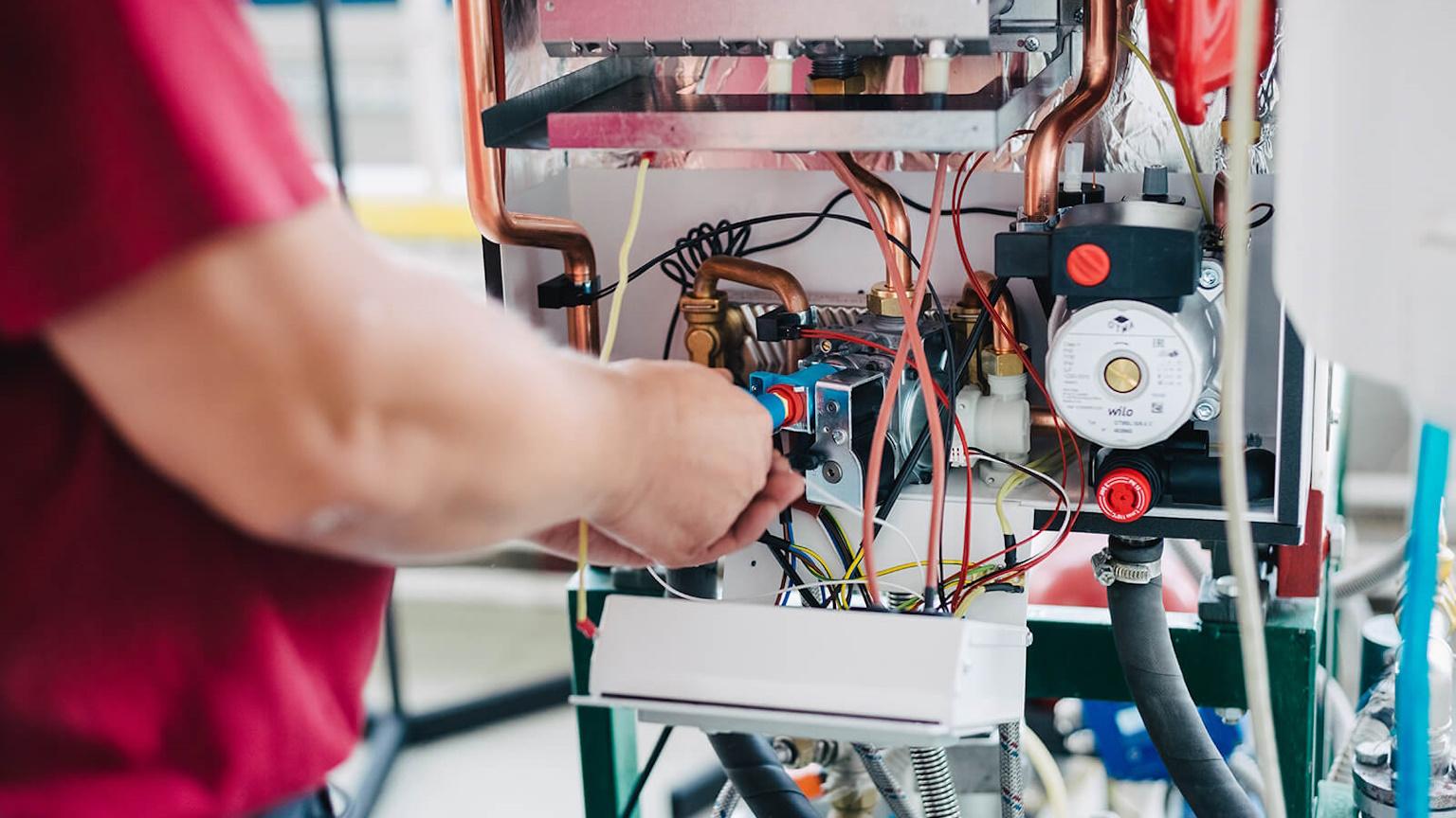 Specialist conducts repair of a electric furnace