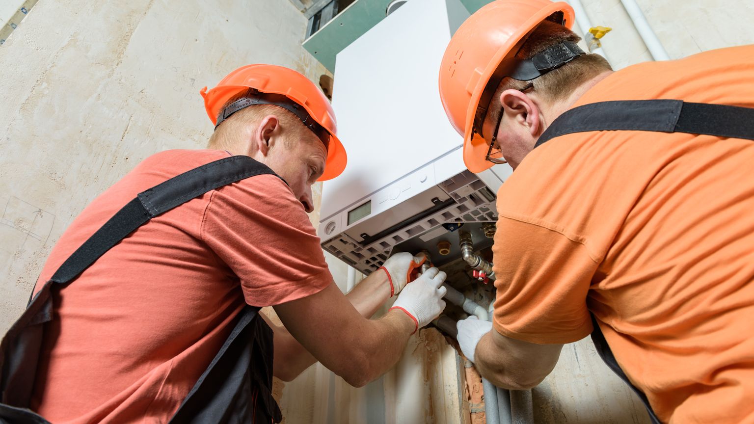 Professional technician performing emergency furnace repair service in Wilsonville home