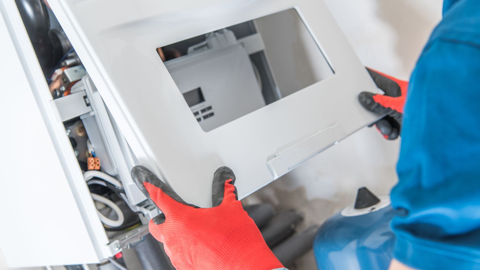 Certified technician installing a gas furnace in a Tualatin home