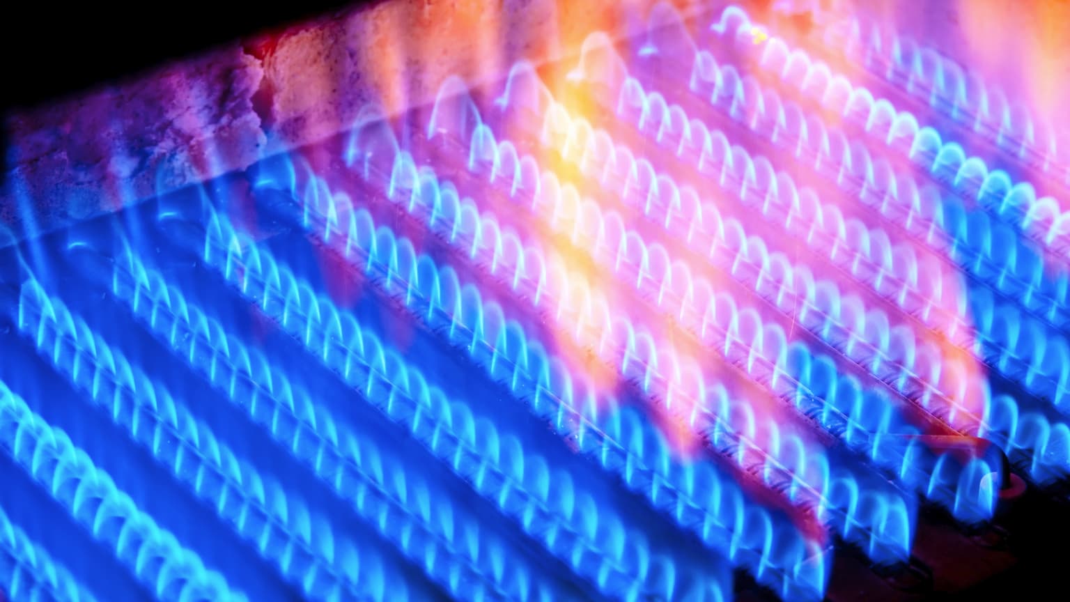 Technician performing a gas furnace tune-up